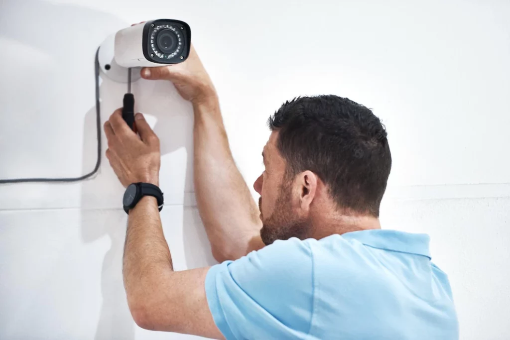 About handymen are always handy have around shot mature man installing security camera building 590464 22167